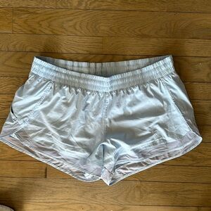 Athleta Xl 4” mesh racer